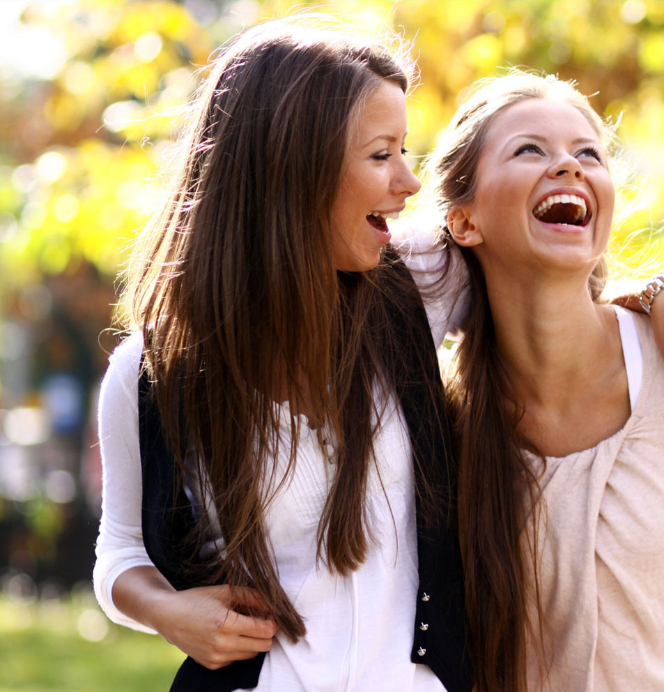 Two women smiling